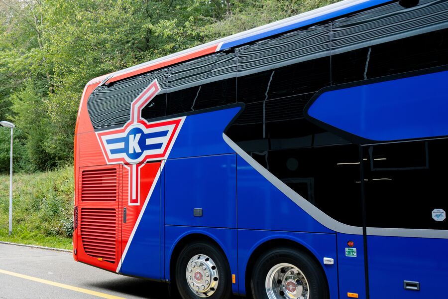 Rear of the EHC Kloten coach with the club crest